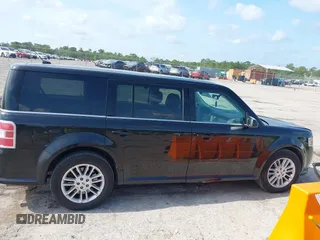 2014 Ford Flex SEL z VIN 2FMGK5C8XEBD13484, wystawiony jako IAAI lot #42235548 z przebiegiem 172 570 mil mil oraz . Historia ofert i sprzedaży dostępna na DreamBid. Obrazek 13.