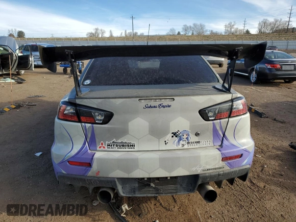 2008 Mitsubishi Lancer Evolution MR z VIN JA3AW56V98U051308, wystawiony jako Copart lot #50452355 z przebiegiem Nie podano mil oraz Szkoda całkowita • Salvage title. Historia ofert i sprzedaży dostępna na DreamBid. Obrazek 6.