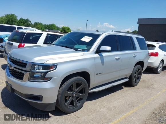 2015 Chevrolet Tahoe LT with VIN 1GNSCBKC9FR111001, listed as a IAAI auction lot 42440624 with 128,087 mi miles and . Bid and sale history available at DreamBid. Image 16.