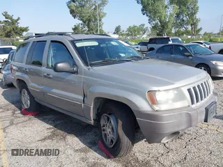 2004 Jeep Grand Cherokee Laredo with VIN 1J4GX48N24C334983, listed as a IAAI auction lot 42522088 with 169,793 mi miles and . Bid and sale history available at DreamBid. Image 1.