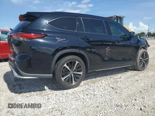 2022 Toyota Highlander XSE with VIN 5TDLZRAH3NS115126, listed as a Copart auction lot 62293825 with 59,189 mi miles and Salvage title. Bid and sale history available at DreamBid. Image 3.