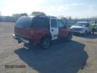 2004 Chevrolet Tahoe LS with VIN 1GNEC13T34J233824, listed as a IAAI auction lot 41877870 with 233,360 mi miles. Bid and sale history available at carsss.com. Image 4.