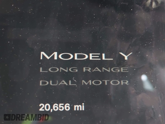 2023 Tesla Model Y Long Range with VIN 7SAYGDEE0PF909610, listed as a IAAI auction lot 41906081 with 20,656 mi miles and . Bid and sale history available at DreamBid. Image 16.