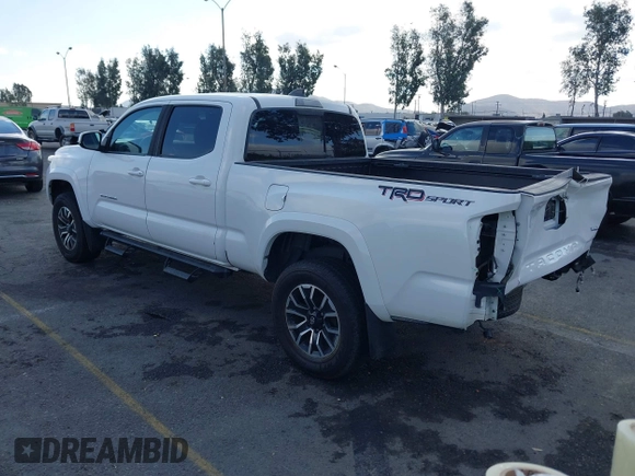 2020 Toyota Tacoma SR5 with VIN 3TMBZ5DN7LM026596, listed as a IAAI auction lot 40705410 with 123,489 mi miles and . Bid and sale history available at DreamBid. Image 3.