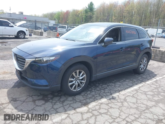 2019 Mazda CX-9 Touring z VIN JM3TCBCY6K0331905, wystawiony jako IAAI lot #42157842 z przebiegiem 84 211 mil mil oraz . Historia ofert i sprzedaży dostępna na DreamBid. Obrazek 20.