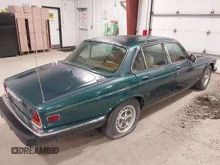 1985 Jaguar XJ with VIN SAJAV1347FC414864, listed as a IAAI auction lot 42118511 with 117,185 mi miles and . Bid and sale history available at DreamBid. Image 4.