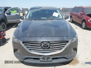 2021 Mazda CX-9 Touring with VIN JM3TCACY2M0502016, listed as a IAAI auction lot 41825456 with 86,068 mi miles and . Bid and sale history available at carsss.com. Image 12.