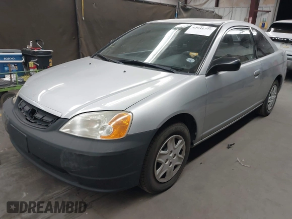 2003 Honda Civic LX with VIN 1HGEM22573L012729, listed as a IAAI auction lot 42041772 with 157,207 mi miles. Bid and sale history available at carsss.com. Image 17.