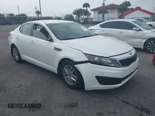 2011 Kia Optima LX with VIN KNAGM4A70B5065293, listed as a IAAI auction lot 38328974 with 224,554 mi miles and . Bid and sale history available at carsss.com. Image 1.
