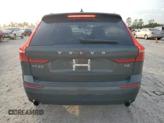 2018 Volvo XC60 Momentum with VIN LYV102RK0JB106389, listed as a Copart auction lot 82677454 with 114,832 mi miles and Salvage Title. Bid and sale history available at carsss.com. Image 6.