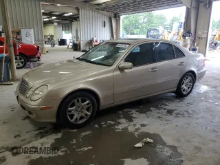 2003 Mercedes-Benz E-Class 3.2L with VIN WDBUF65J03A097069, listed as a Copart auction lot 66235744 with 168,623 mi miles and Clean Title. Bid and sale history available at carsss.com. Image 1.