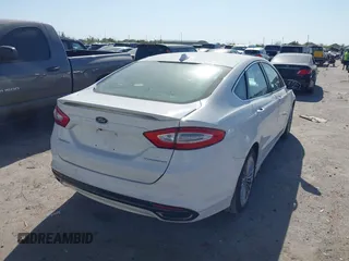 2014 Ford Fusion Titanium with VIN 3FA6P0K93ER277076, listed as a IAAI auction lot 41858755 with 209,233 mi miles and . Bid and sale history available at DreamBid. Image 4.