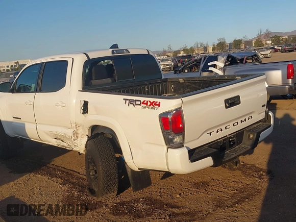 2023 Toyota Tacoma 4WD SR with VIN 3TMCZ5AN8PM647845, listed as a IAAI auction lot 41371634 with 21,917 mi miles. Bid and sale history available at carsss.com. Image 6.