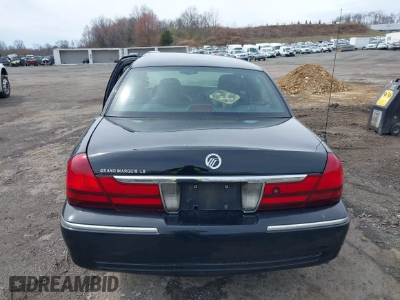 2005 Mercury Grand Marquis LS Premium z VIN 2MEFM75W65X671622, wystawiony jako IAAI lot #41958287 z przebiegiem 154 662 mil mil oraz . Historia ofert i sprzedaży dostępna na DreamBid. Obrazek 16.