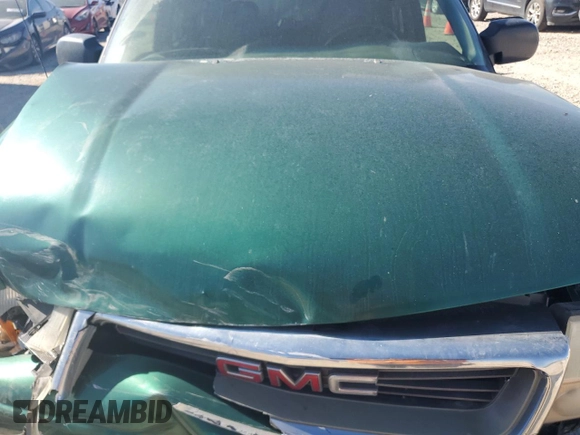 2000 GMC Jimmy SLE Convenience z VIN 1GKDT13W3Y2215035, wystawiony jako Copart lot #77484104 z przebiegiem 116 124 mil mil oraz Szkoda całkowita • Salvage title. Historia ofert i sprzedaży dostępna na DreamBid. Obrazek 12.