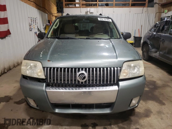 2007 Mercury Mariner Luxury z VIN 4M2CU91147KJ00348, wystawiony jako Copart lot #89218185 z przebiegiem 184 182 mil mil oraz Szkoda całkowita • Salvage title. Historia ofert i sprzedaży dostępna na DreamBid. Obrazek 5.