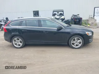 2015 Volvo V60 z VIN YV1612SB7F1208813, wystawiony jako IAAI lot #42436557 z przebiegiem 123 776 mil mil oraz . Historia ofert i sprzedaży dostępna na DreamBid. Obrazek 13.