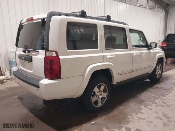 2010 Jeep Commander Sport with VIN 1J4RG4GK7AC132121, listed as a IAAI auction lot 41187854 with 155,413 mi miles. Bid and sale history available at carsss.com. Image 4.