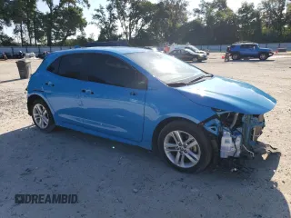 2021 Toyota Corolla Hatchback SE with VIN JTND4MBE5M3135173, listed as a Copart auction lot 60318104 with 55,308 mi miles and Salvage Title. Bid and sale history available at carsss.com. Image 4.