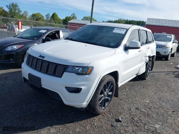 2021 Jeep Grand Cherokee Laredo X with VIN 1C4RJFAG7MC828165, listed as a IAAI auction lot 39970936 with 81,115 mi miles. Bid and sale history available at carsss.com. Image 2.