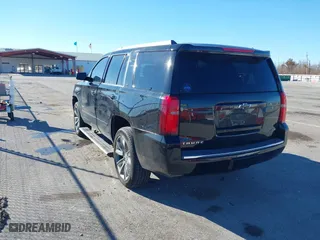 2015 Chevrolet Tahoe LTZ with VIN 1GNSCCKC8FR581994, listed as a IAAI auction lot 41406219 with 187,802 mi miles. Bid and sale history available at carsss.com. Image 3.
