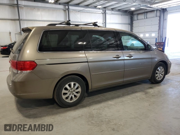 2009 Honda Odyssey EX с VIN 5FNRL38479B019599, выставлен на аукционе Copart как лот 56375175 с пробегом 241 526 миль миль и Списание • Salvage title. История ставок и продаж доступна на DreamBid. Изображение 3.