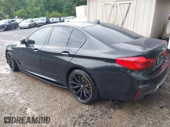 2018 BMW 5 Series M550i xDrive with VIN WBAJB9C5XJB286923, listed as a IAAI auction lot 42527301 with 76,923 mi miles and . Bid and sale history available at DreamBid. Image 3.
