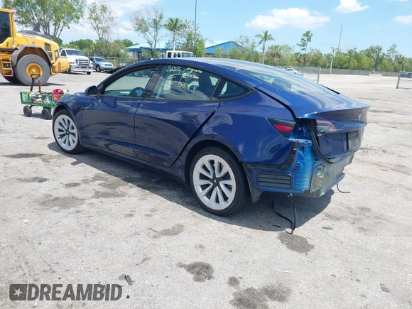 2023 Tesla Model 3 with VIN 5YJ3E1EA0PF658080, listed as a IAAI auction lot 42008846 with 32,301 mi miles and . Bid and sale history available at carsss.com. Image 3.