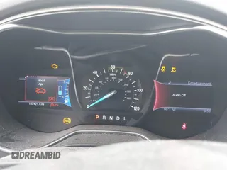 2013 Ford Fusion SE Hybrid with VIN 3FA6P0LU0DR128688, listed as a IAAI auction lot 42580852 with 137,421 mi miles and . Bid and sale history available at DreamBid. Image 7.