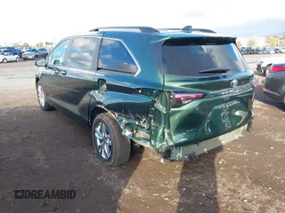 2024 Toyota Sienna XLE with VIN 5TDJSKFC7RS135935, listed as a IAAI auction lot 41409630 with 5,477 mi miles and . Bid and sale history available at DreamBid. Image 3.