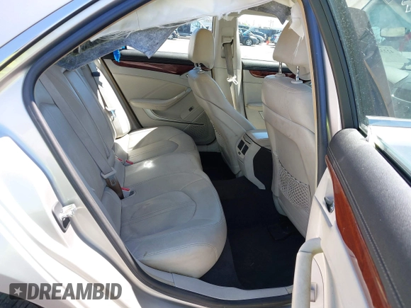 2008 Cadillac CTS RWD with VIN 1G6DM577280111413, listed as a IAAI auction lot 42238643 with 114,706 mi miles and . Bid and sale history available at DreamBid. Image 8.