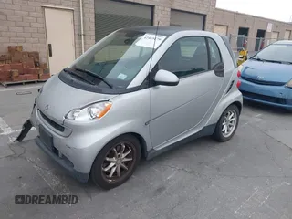2009 Smart fortwo Pure z VIN WMEEJ31X99K209322, wystawiony jako IAAI lot #42465179 z przebiegiem 75 730 mil mil oraz . Historia ofert i sprzedaży dostępna na DreamBid. Obrazek 17.