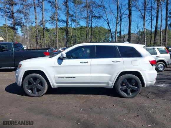 2015 Jeep Grand Cherokee Altitude with VIN 1C4RJFAG4FC924869, listed as a IAAI auction lot 41656444 with 112,786 mi miles. Bid and sale history available at carsss.com. Image 14.