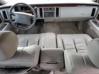 1996 Cadillac Fleetwood z VIN 1G6DW52P6TR702611, wystawiony jako Copart lot #77202664 z przebiegiem 159 994 mil mil oraz Szkody całkowita. Historia ofert i sprzedaży dostępna na DreamBid. Obrazek 8.