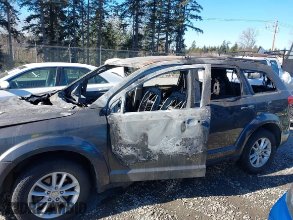 2015 Dodge Journey SXT with VIN 3C4PDDBG3FT755577, listed as a IAAI auction lot 41560150 with Not Provided miles and . Bid and sale history available at DreamBid. Image 6.