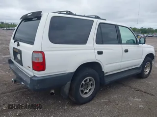 1998 Toyota 4Runner with VIN JT3GM84R5W0031171, listed as a IAAI auction lot 41989920 with 163,296 mi miles and . Bid and sale history available at DreamBid. Image 4.