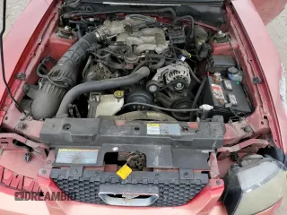 2002 Ford Mustang Standard z VIN 1FAFP40412F107189, wystawiony jako Copart lot #58425645 z przebiegiem 148 551 mil mil oraz Szkoda całkowita • Salvage title. Historia ofert i sprzedaży dostępna na DreamBid. Obrazek 11.