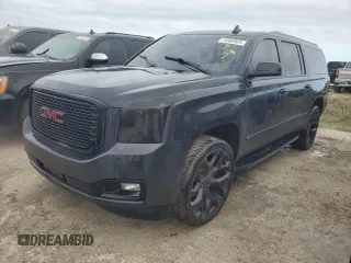 2015 GMC Yukon XL SLE z VIN 1GKS1GKC9FR671620, wystawiony jako Copart lot #74560904 z przebiegiem Nie podano mil oraz Nie do naprawy • Non repairable. Historia ofert i sprzedaży dostępna na DreamBid. Obrazek 1.