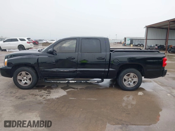 2005 Dodge Dakota SLT z VIN 1D7HE48N05S304121, wystawiony jako IAAI lot #42165773 z przebiegiem 192 886 mil mil oraz . Historia ofert i sprzedaży dostępna na DreamBid. Obrazek 14.