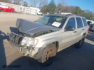 2004 Jeep Grand Cherokee Laredo with VIN 1J4GX48S44C284478, listed as a IAAI auction lot 41253167 with 1 mi miles. Bid and sale history available at carsss.com. Image 17.