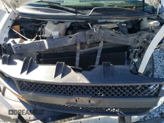 2012 Chevrolet Express Cargo z VIN 1GCWGFCAXC1184326, wystawiony jako Copart lot #88801015 z przebiegiem 393 415 mil mil oraz Szkoda całkowita • Salvage title. Historia ofert i sprzedaży dostępna na DreamBid. Obrazek 12.
