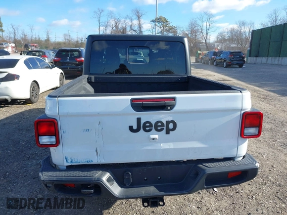 2022 Jeep Gladiator Willys with VIN 1C6HJTAG1NL117631, listed as a IAAI auction lot 41230291 with 33,463 mi miles and . Bid and sale history available at DreamBid. Image 16.