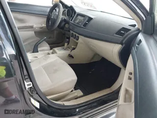 2010 Mitsubishi Lancer DE with VIN JA32U1FU3AU030048, listed as a IAAI auction lot 41953386 with 216,341 mi miles. Bid and sale history available at carsss.com. Image 5.