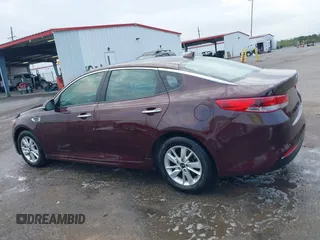 2016 Kia Optima LX with VIN 5XXGT4L32GG105361, listed as a IAAI auction lot 42066431 with 61,026 mi miles. Bid and sale history available at carsss.com. Image 14.