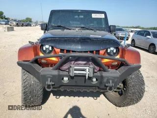 2012 Jeep Wrangler Unlimited Sport with VIN 1C4BJWDG0CL200802, listed as a Copart auction lot 63822365 with 116,501 mi miles and Salvage title. Bid and sale history available at DreamBid. Image 5.