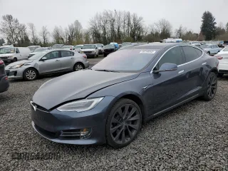 2020 Tesla Model S Long Range with VIN 5YJSA1E24LF379032, listed as a Copart auction lot 49258055 with 64,923 mi miles and Salvage Title. Bid and sale history available at carsss.com. Image 1.