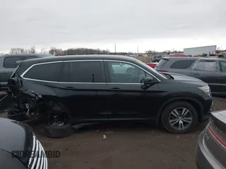 2016 Honda Pilot EX with VIN 5FNYF6H38GB040082, listed as a IAAI auction lot 41837136 with 147,562 mi miles. Bid and sale history available at carsss.com. Image 13.