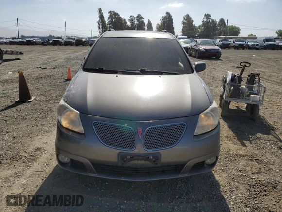 2005 Pontiac Vibe z VIN 5Y2SL63855Z404970, wystawiony jako Copart lot #56750875 z przebiegiem 128 636 mil mil oraz Szkoda całkowita • Salvage title. Historia ofert i sprzedaży dostępna na DreamBid. Obrazek 5.