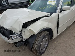 2005 Chrysler 300 Touring z VIN 2C3AA53G95H547489, wystawiony jako IAAI lot #42247825 z przebiegiem 189 694 mil mil oraz . Historia ofert i sprzedaży dostępna na DreamBid. Obrazek 6.