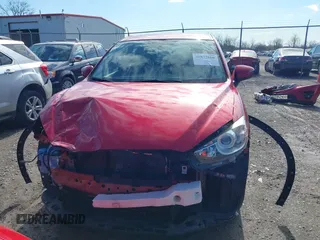 2016 Mazda CX-5 Touring with VIN JM3KE4CY5G0630438, listed as a IAAI auction lot 41877660 with 56,960 mi miles. Bid and sale history available at carsss.com. Image 13.
